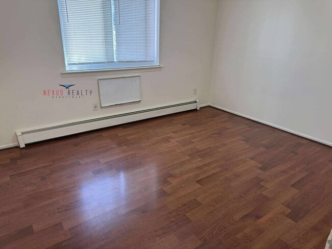 Building Photo - 34-39-39 69th St