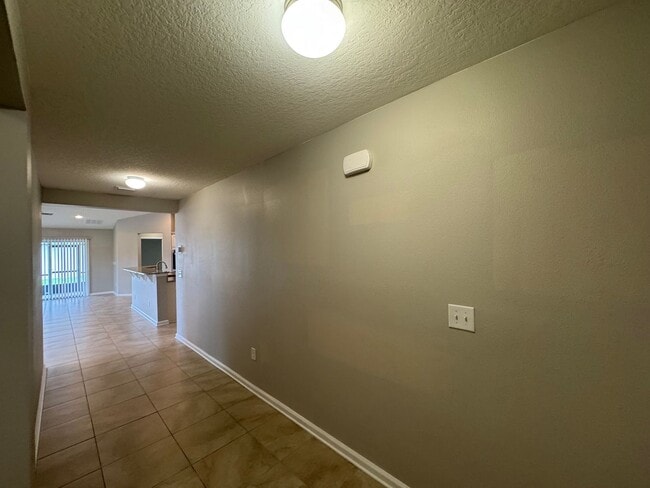 Building Photo - Available NOW!!Your Dream Home Awaits: Luxurious 3-Bedroom Oasis, Just Minutes from Daytona Beach!