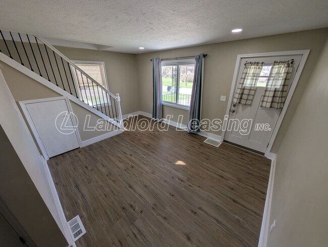 Building Photo - Updated 3-Bedroom Home with Private Upper Suite & Detached Garage