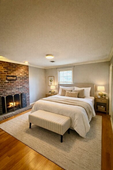 Cozy Primary Bedroom with fireplace - 121 Arcadia Ln