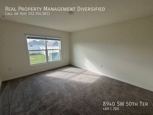 Building Photo - 8940 SW 50th Ter