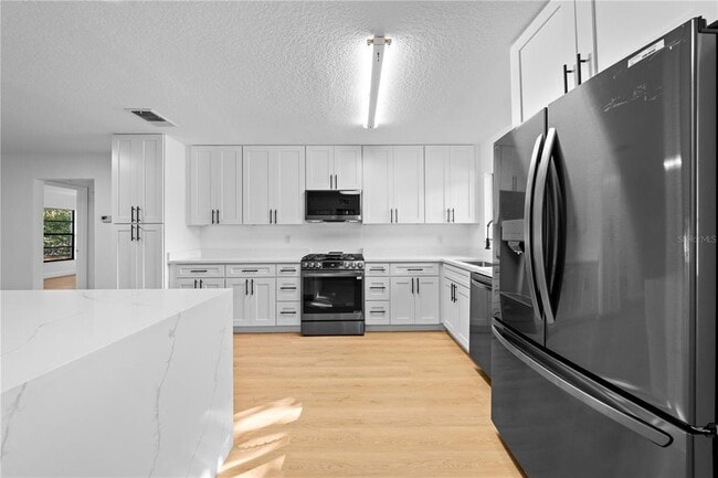 Building Photo - 5003 Gardengate Ln