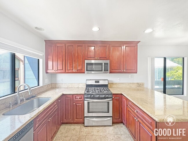 Building Photo - Light-Filled 2BD/2BA Top-Floor Condo in Mira Mesa with Granite Kitchen, Private Balcony & Pool