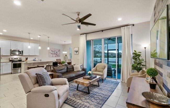 Building Photo - Water Front Home- 4 Large Bedrooms-3 baths Gated Community Call Sheila Campbell 407-687-7900