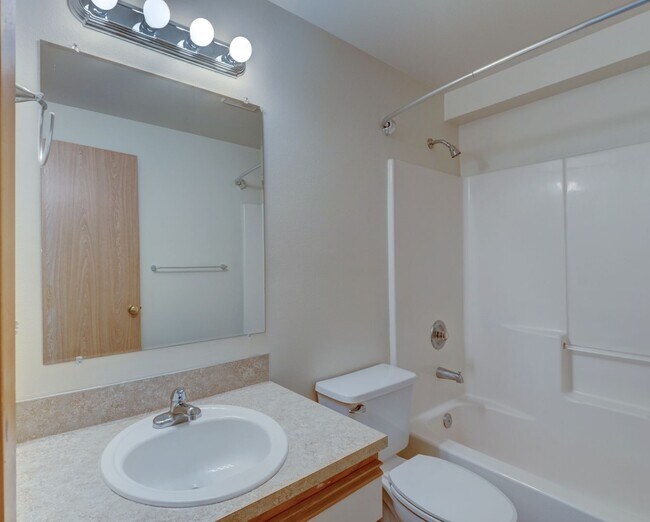 Building Photo - 2 bedroom/2 bathroom: Ground-Floor Condo with Partial Water View