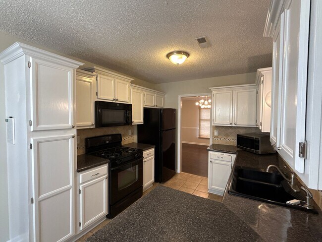 Building Photo - T.R. Lawing Realty Property