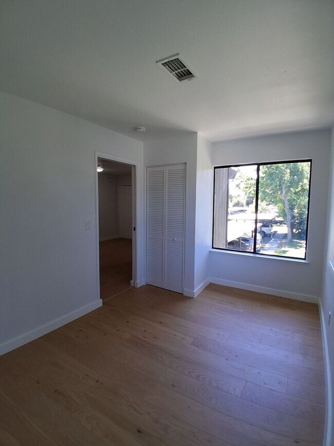 Building Photo - MOVE-IN SPECIAL: HALF OFF THE 1ST MONTH'S RENT – Beautifully Updated 2 Bedroom, 1 Bathroom Condo!
