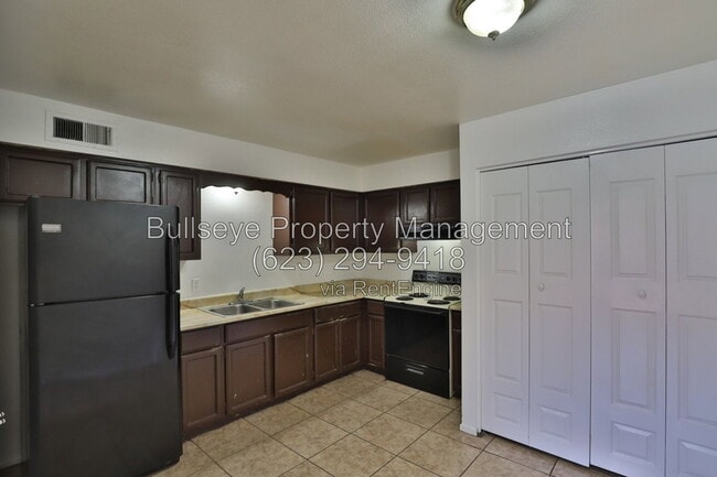 Building Photo - 859 W Ray Rd