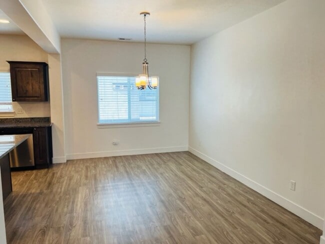 Building Photo - Beautiful 2018 townhome with 2 car garage and tall ceilings.