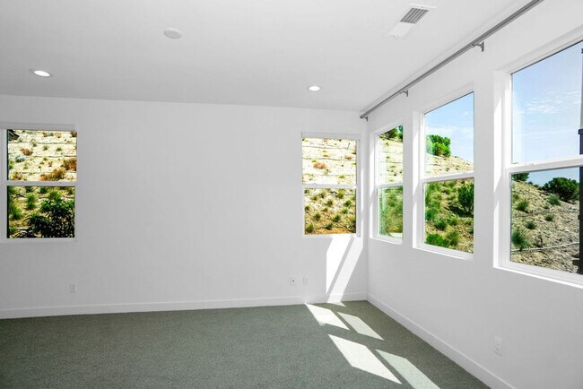 Building Photo - Gorgeous brand new townhome in 3Roots! End...