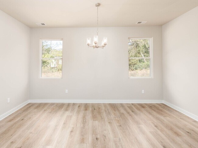 Building Photo - Beautiful 5 Bedroom, 2.5 Bath New Construc...
