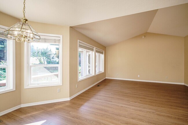 Building Photo - Beautifully Landscaped 1/4 acre with Well Maintained 4 bedroom 2 Bath Home with 3 Car Garage