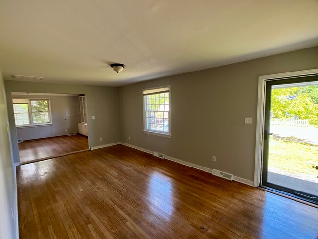 Front Door. andLiving Room - 1608 Brigham Rd