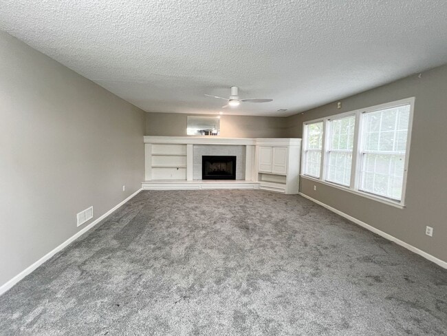 Building Photo - SEE IT NOW: Spacious 3-Bedroom Smart Home ...