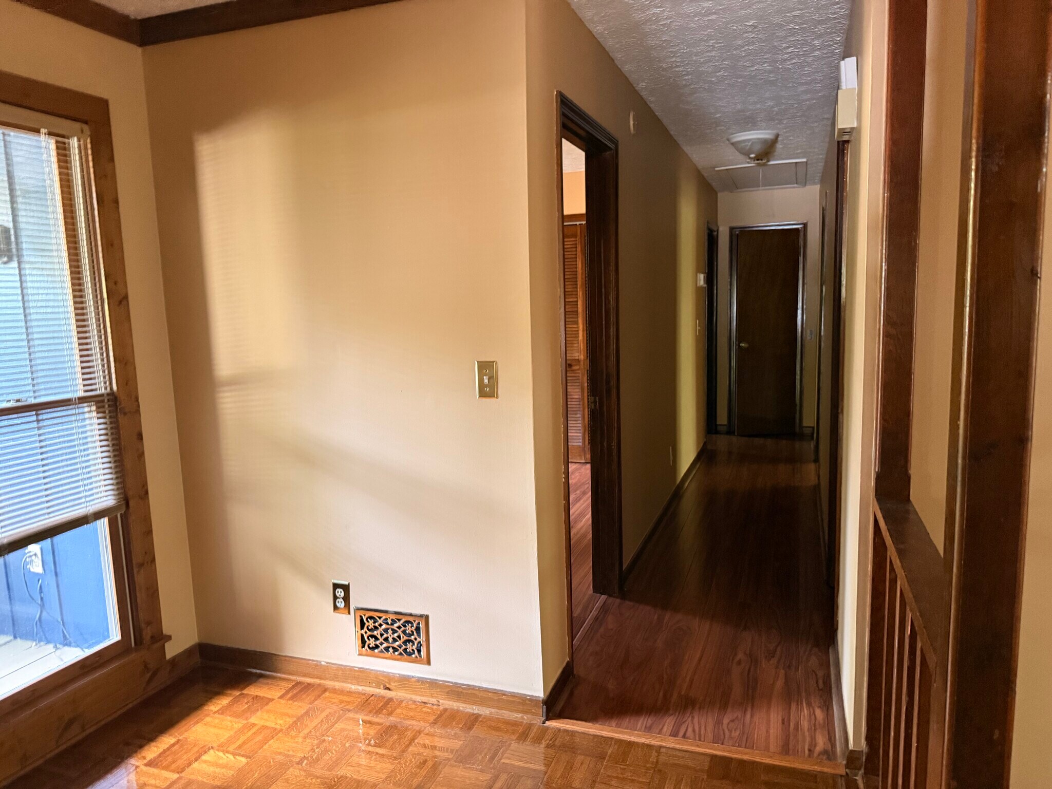 Hallway by the front door leading to the 3 bedrooms - 2928 Sanibel Dr
