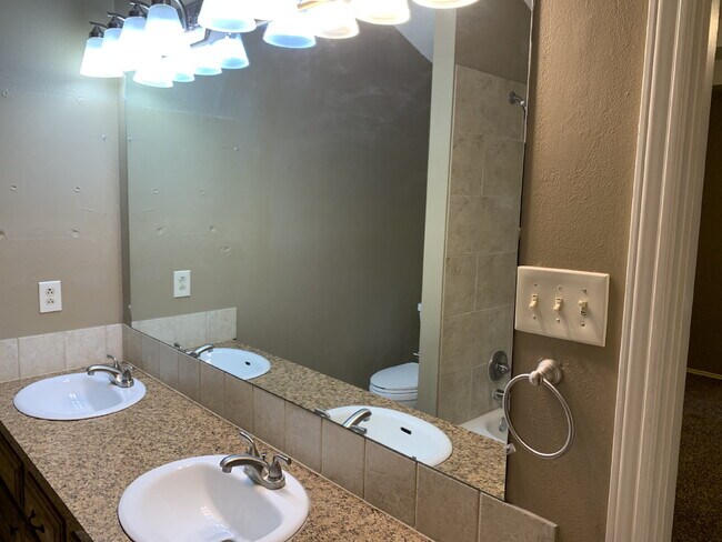 Building Photo - Spacious South Lubbock Townhome with Bonus Space & 2-Car Garage