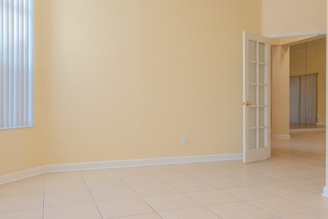 Building Photo - Spacious 5BR Home in Falcon Trace | 3-Car Garage | Screened Patio | Resort-Style Amenities Rent: ...