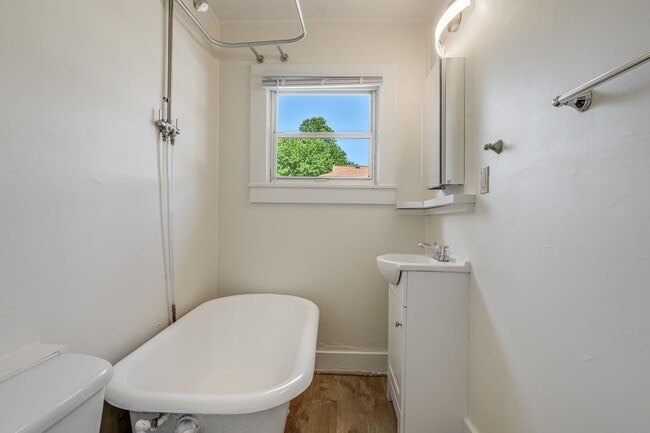Building Photo - Charming 1930s Shotgun Duplex – Updated Bath, Walk-In Pantry, Water Included