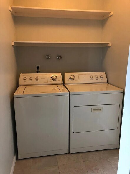Washer/dryer next to primary bedroom - 594 Ingalls St
