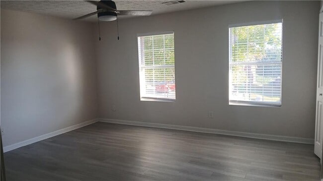 Building Photo - 5677 Wind Gate Ln