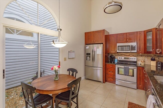 Building Photo - ? Charming Longwood Townhome with Modern Updates & Solar Power