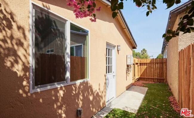 Building Photo - 9219 Langdon Ave