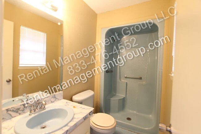 Building Photo - New On The Market! 3BR 2BA + Lower Level D...