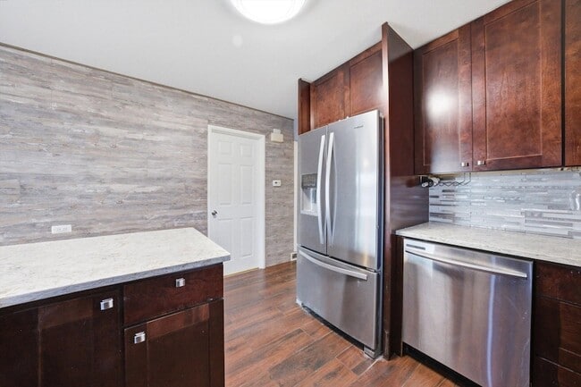 Building Photo - 4605 S Laramie Ave