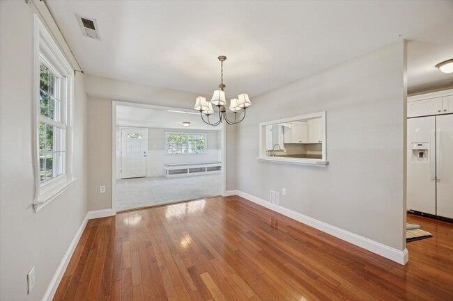 Building Photo - Available Immediately – 4 Bedroom End-Unit...