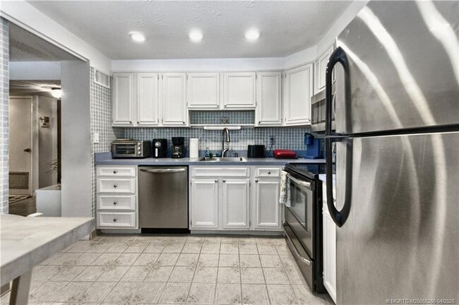 Building Photo - 1800 SE St Lucie Blvd