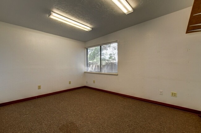 Building Photo - Nice three bedroom two bath home in PV!