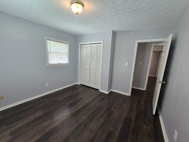 Building Photo - Brick Ranch in the heart of Jeffersontown! Featuring hardwood styled floors, 3 Bedrooms, 1.5 Bath...