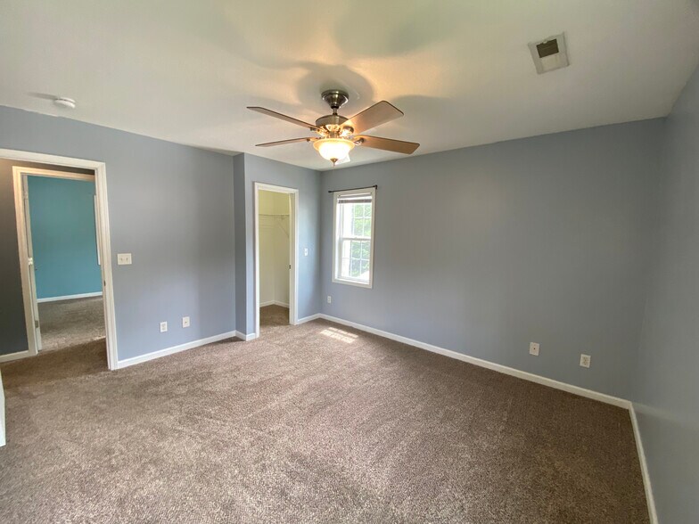 Primary Bedroom w. walk-in closet - 12 Brookside Cir