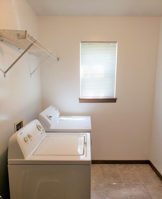 Building Photo - Upstairs Four Bedroom Apartment by Quality Home Management