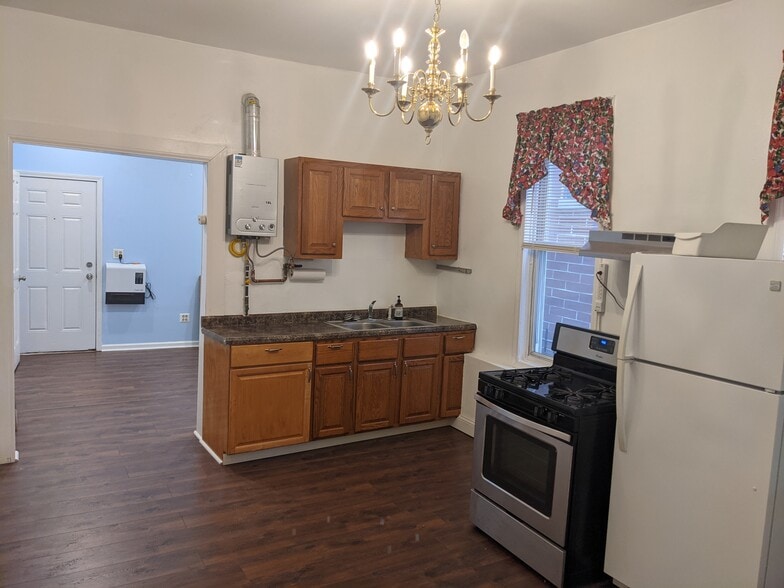 Kitchen cabinets and water heater - 2455 W Cortland St
