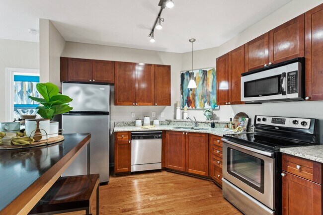 Stainless steel appliances in select kitchens - AMLI Lindbergh