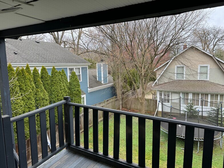 Upstairs porch and back stairs to yard - 878 Ash St