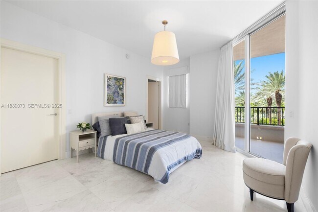 Building Photo - 7133 Fisher Island Dr