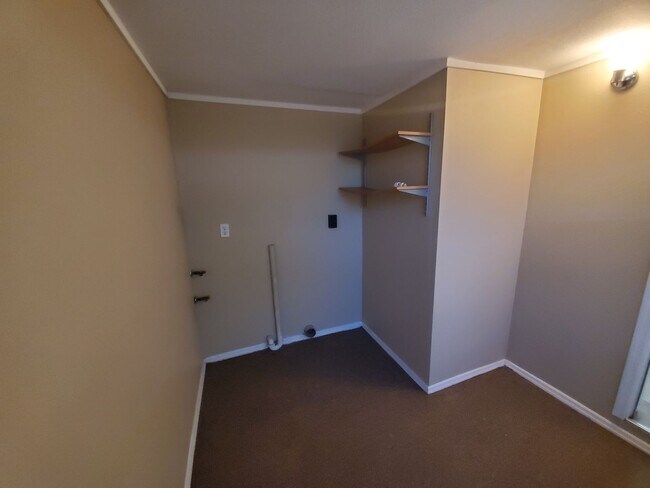 Building Photo - Two Bedroom House with carport