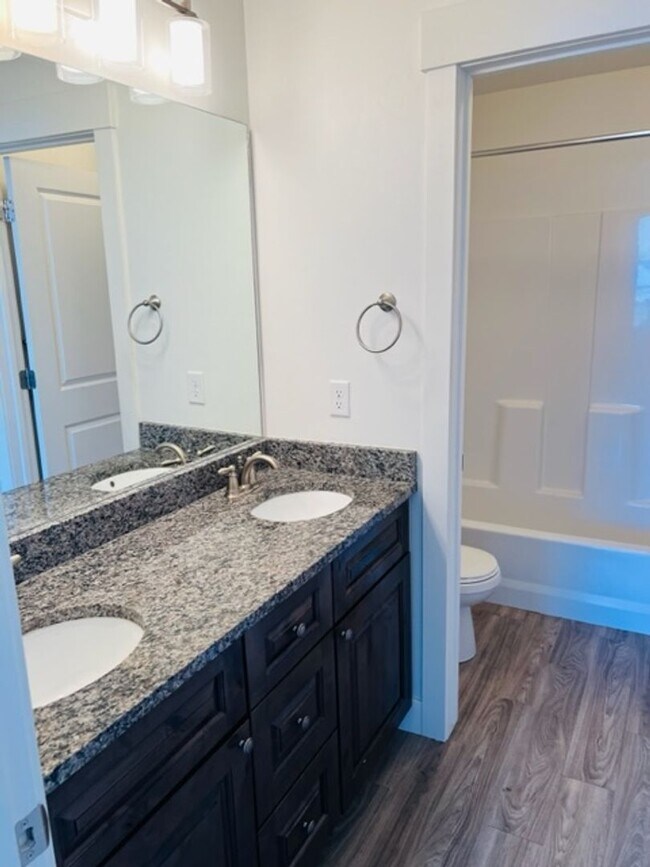Building Photo - Beautiful 2018 townhome with 2 car garage and tall ceilings.