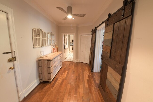 Building Photo - Charming 2BR + home office Condo in the he...