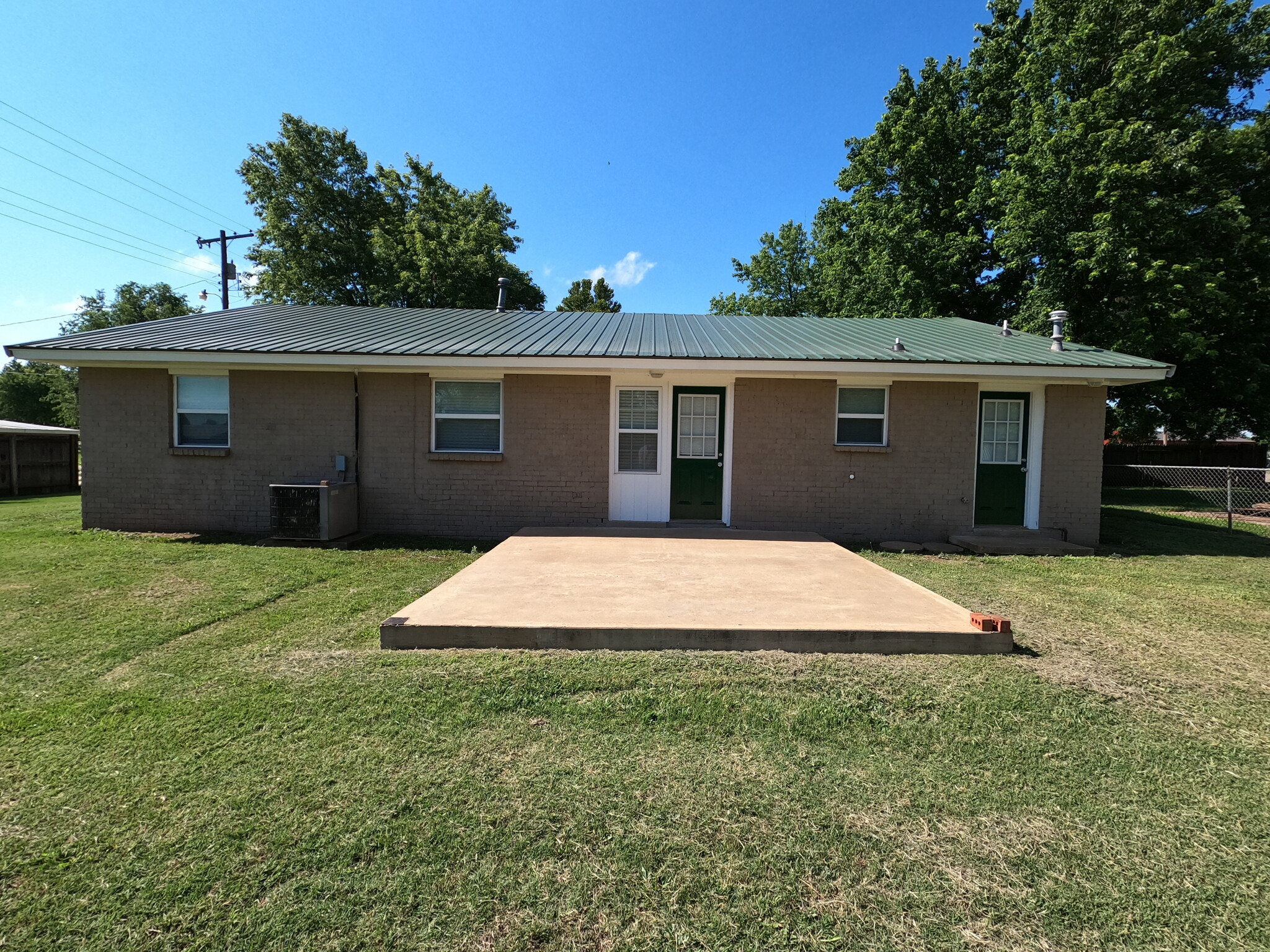 Back view of house with back porch - 415 W Guthrie St