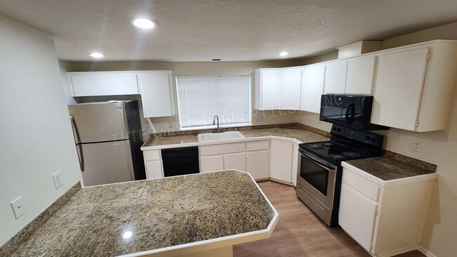 Building Photo - Remodeled 3 Bd Home W/ Washer & Dryer Hook-ups, Large Fenced Backyard, Gas Fireplace & 2 Car Garage!