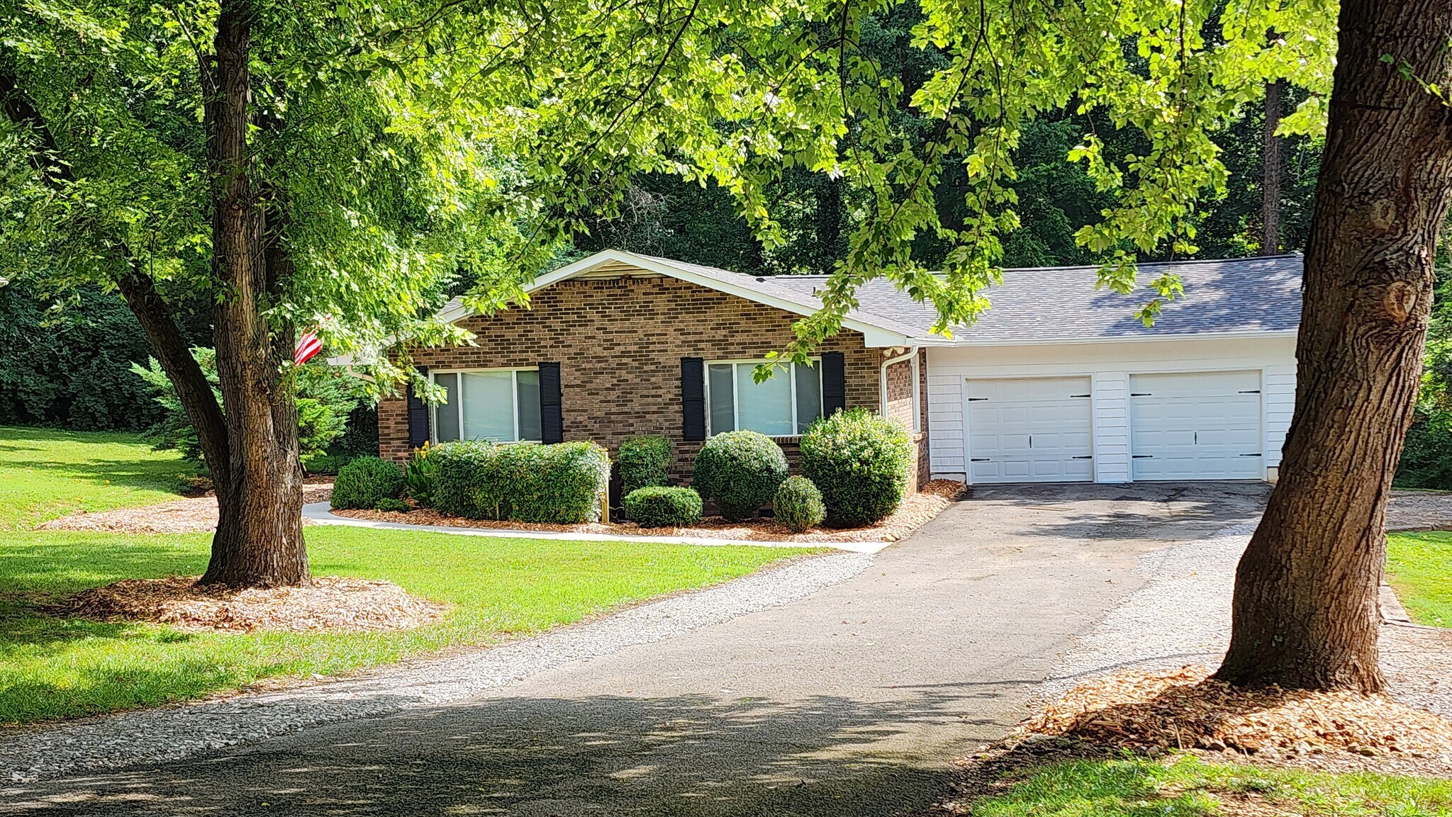 Ample driveway parking and 2 car garage - 1 side per unit of duplex - 720 Shadycrest Dr