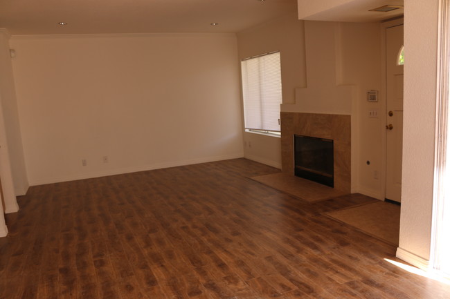 Living room with fireplace - 12411 Osborne St