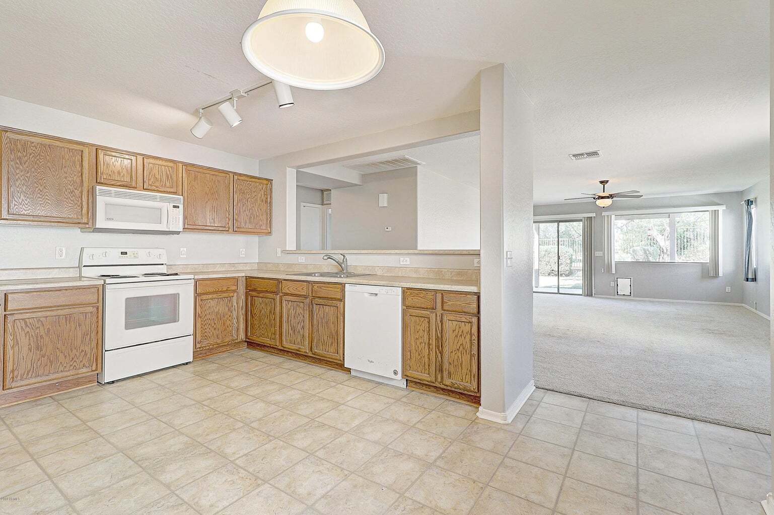 Kitchen with view to Livingrooom - 25586 W North Star Ln