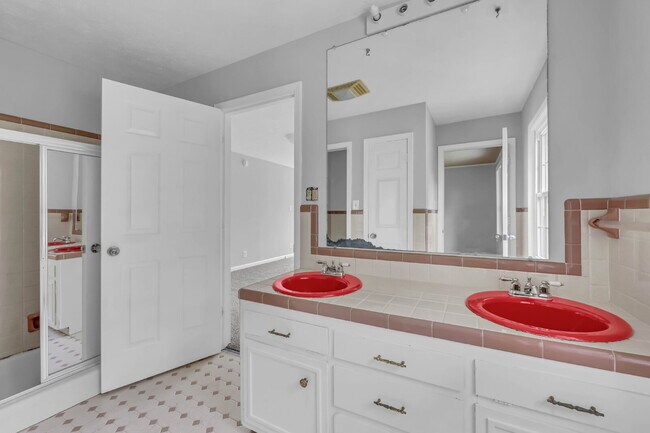 Building Photo - spacious 4-bedroom, 2.5-bath home featuring a 2-car garage and fresh updates throughout.