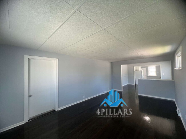 Building Photo - "Charming 3-Bed Home with Partially Finished Basement & Gleaming Hardwood Floors in Hammond - 226...