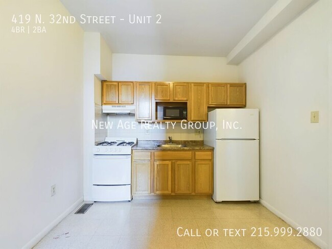 Building Photo - Spacious, Bi-level Apartment Available at ...