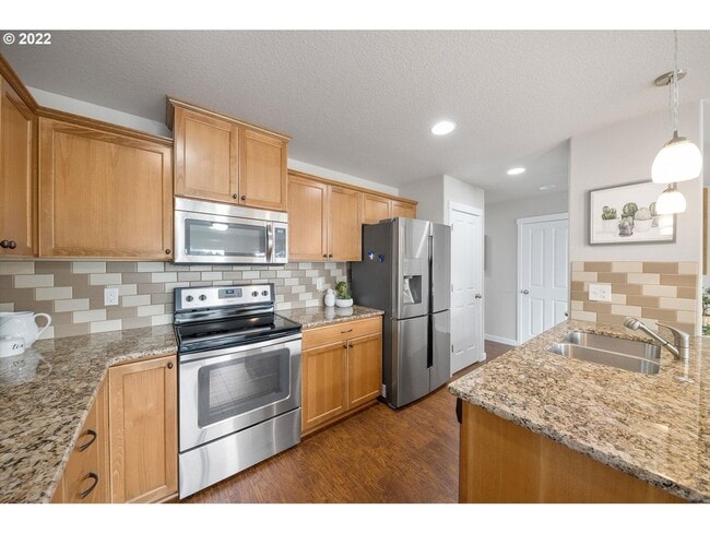 Building Photo - Spacious 3-Bedroom Townhome with Granite Kitchen & Included Landscaping